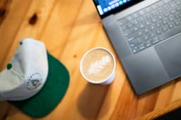 Working on a laptop in a cafe